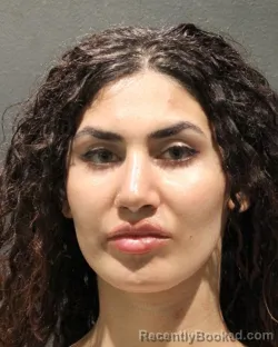 Mugshot of Tasbyha Aman booked in Arlington County, Virginia on August 30, 2026