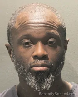Mugshot of Augustine Kwarteng Acheampo booked in Arlington County, Virginia on August 31, 2026