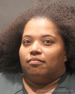 Mugshot of Nichole Eboniese Renier booked in Arlington County, Virginia on September 2, 2026