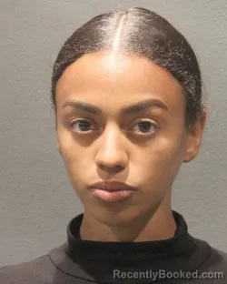 Mugshot of Treasure Marie Destiny Henderson booked in Arlington County, Virginia on September 3, 2026