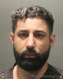 Mugshot of Akashdeep Singh Malhi booked in Arlington County, Virginia on September 7, 2026