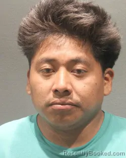 Mugshot of Benito Elias Loayes Agustin booked in Arlington County, Virginia on September 13, 2026