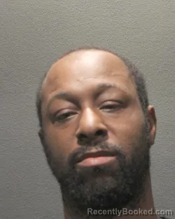 Mugshot of Dominique Burden booked in Arlington County, Virginia on October 5, 2026