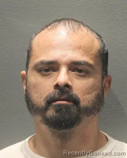 Mugshot of Delfino Alexander Ramirez booked in Arlington County, Virginia on October 6, 2026