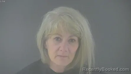 Mugshot of CRYSTAL GAYLE REYNOLDS