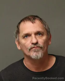 Mugshot of MILFORD EUGENE HICKS