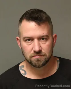Mugshot of AARON KYLE CUTCHENS