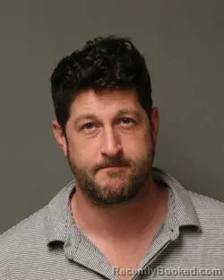 Mugshot of HEATH BARKER HETTIG