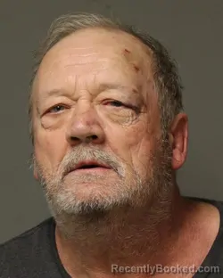 Mugshot of THOMAS EDGAR MELTON