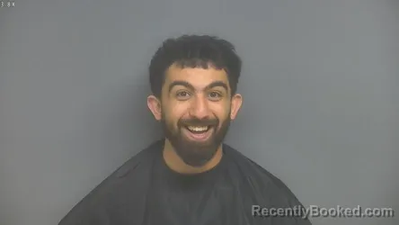 Mugshot of AKRAM MOHAMED AHIRI