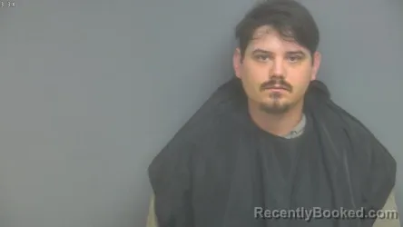 Mugshot of CLAYTON ASHTON MANN