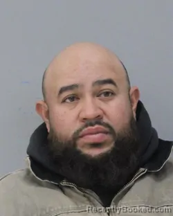 Mugshot of EXONN ALEJANDRO DE LA ROSA