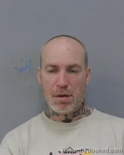 Mugshot of JUSTIN BRADLEY FRENIER