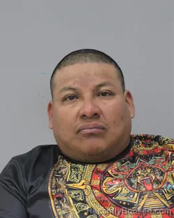 Mugshot of JUAN FLORES-CRUZ