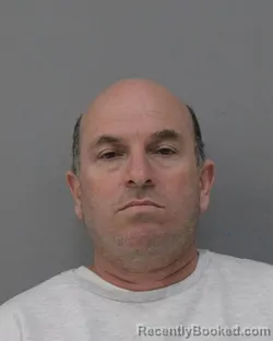 Mugshot of RIAD AKHUNDOV