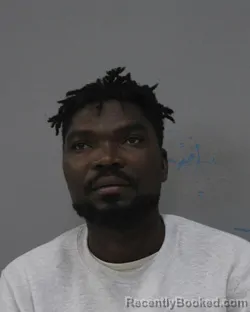 Mugshot of KOL AMOUZOU booked in Charles City County, Virginia on March 12, 2026