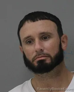 Mugshot of MATTHEW EDWARD NEWCOMB