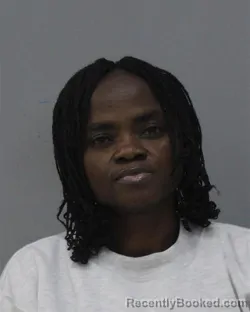 Mugshot of JOSEFINA MAYAMBA KIYNGU booked in Charles City County, Virginia on March 19, 2026