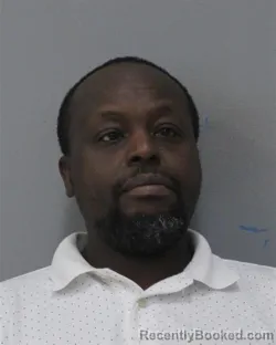 Mugshot of SAMUEL WANYORO booked in Charles City County, Virginia on March 20, 2026