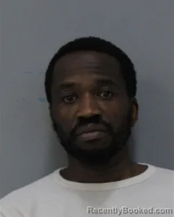 Mugshot of OLUWASHOLA AYODEJI AMOSUN booked in Charles City County, Virginia on June 23, 2026