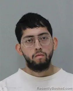 Mugshot of Aaron Javier Cruz booked in Charles City County, Virginia on August 28, 2026