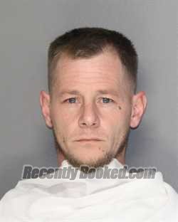 Booking photo from Ellis County, Texas