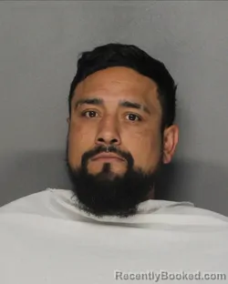 Mugshot of DANIEL ENRIQUE QUINTOR