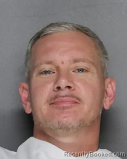 Mugshot of JASON MATTHEW POINDEXTER