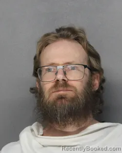 Mugshot of BENJAMIN MARCHANT FAULKNER booked in Ellis County, Texas on May 12, 2026