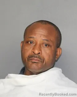 Mugshot of EMEKA AKPUNKU booked in Ellis County, Texas on May 27, 2026