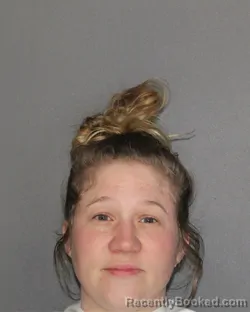 Mugshot of Logan Alexandria Paige Sampert booked in Ellis County, Texas on August 22, 2026