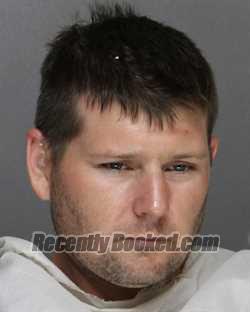 Booking photo from Ellis County, Texas