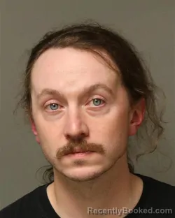 Mugshot of JOSHUA AARON ELLIOT booked in Grayson County, Virginia on April 1, 2026