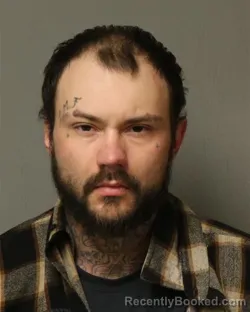 Mugshot of AUSTIN TYLER RECTOR booked in Grayson County, Virginia on March 12, 2026