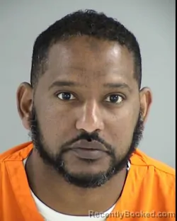 Mugshot of MUSAAB BABIKER HASHIM booked in Henrico County, Virginia on March 25, 2026