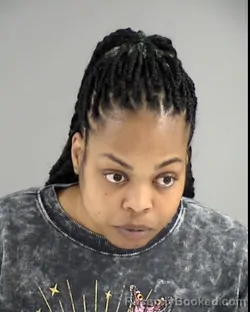 Mugshot of FLORENZA ELISA BROWN booked in Henrico County, Virginia on March 13, 2026