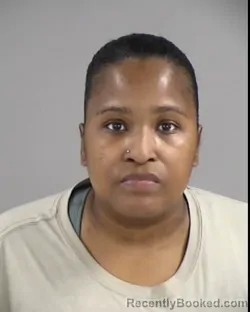 Mugshot of TASHARKA NATAYER GORDON booked in Henrico County, Virginia on March 24, 2026