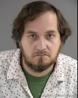 Mugshot of TYLER JUSTIN ALCOCK booked in Henrico County, Virginia on March 17, 2026