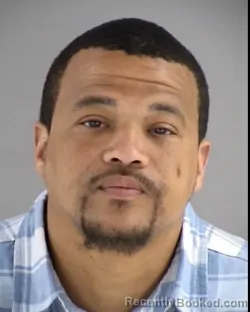 Mugshot of DE'QUANE LAMONT DAVIS booked in Henrico County, Virginia on March 25, 2026