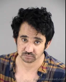 Mugshot of UMESH ADHIKARI booked in Henrico County, Virginia on March 7, 2026