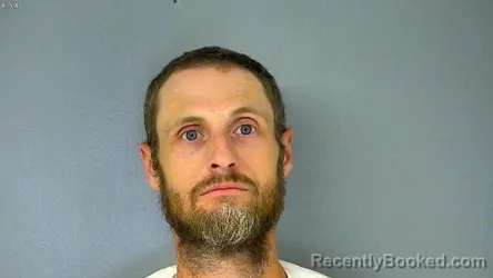 Mugshot of Joshua Paul Queen booked in James City County, Virginia on October 2, 2026