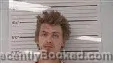 Mugshot of John Leon Samuel Adams booked in Middlesex County, Virginia on August 7, 2026