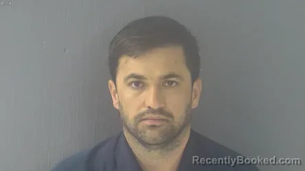 Mugshot of MOHAMMAD ERSHAD AFZALI booked in New Kent County, Virginia on March 20, 2026