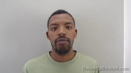 Mugshot of KELLY MUNYANEZA