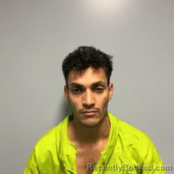 Mugshot of MARIO ANTONIO REYES-FERNANDEZ