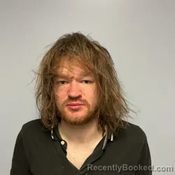 Mugshot of DANE ALLEN HOMICZEWSKI