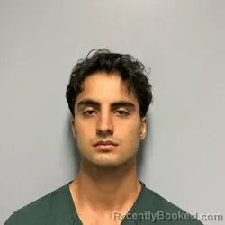 Mugshot of MOHAMMAD EDRIS ZAZAI booked in Roanoke County, Virginia on June 13, 2026