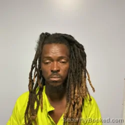 Mugshot of Komla Francis Ayite booked in Roanoke County, Virginia on September 2, 2026
