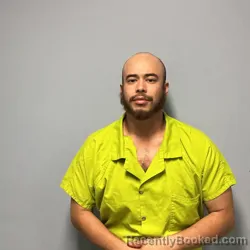 Mugshot of Moises Javier Mena booked in Roanoke County, Virginia on September 11, 2026