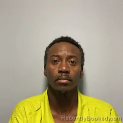 Mugshot of Dagobert Alcide booked in Roanoke County, Virginia on September 14, 2026